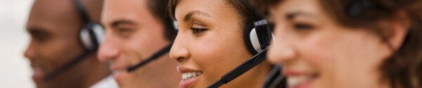 Happy call center employees with headset Group of happy call center employees with headset